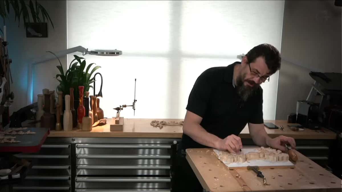 Leaning in over a floral panel