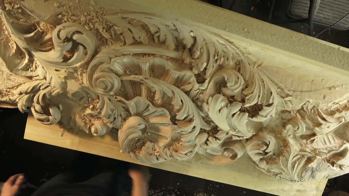 A long panel of high relief acanthus on the bench, shavings everywhere.