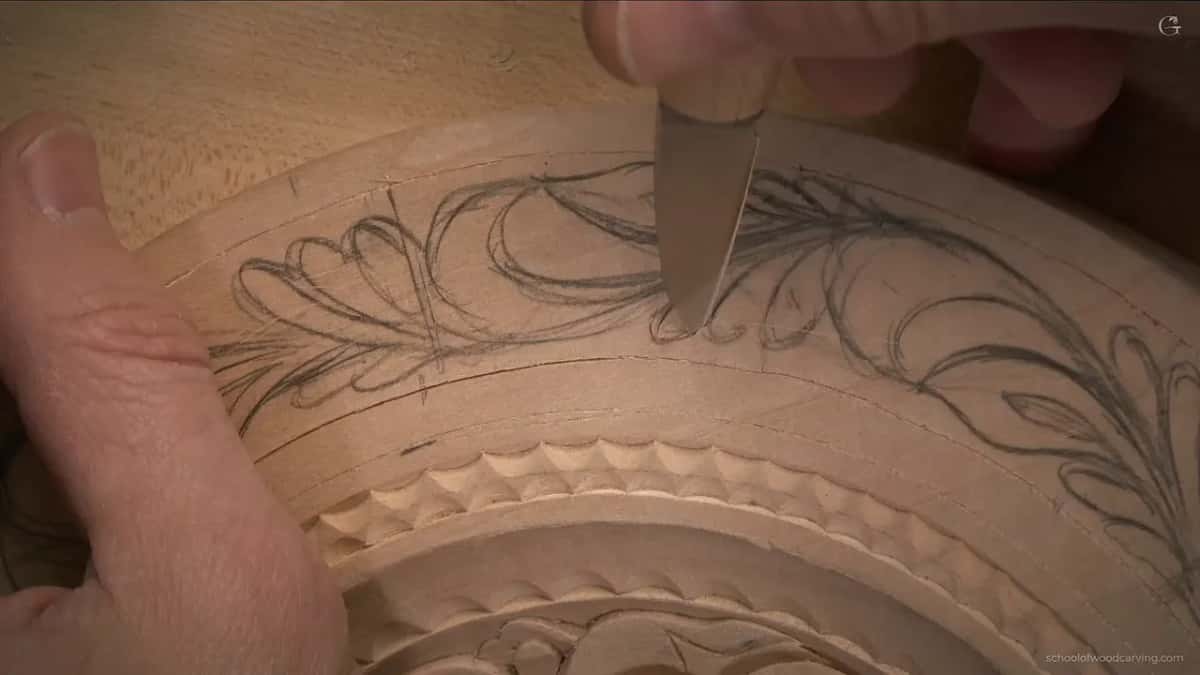 The blade stands almost upright, its tip in a pencil curve