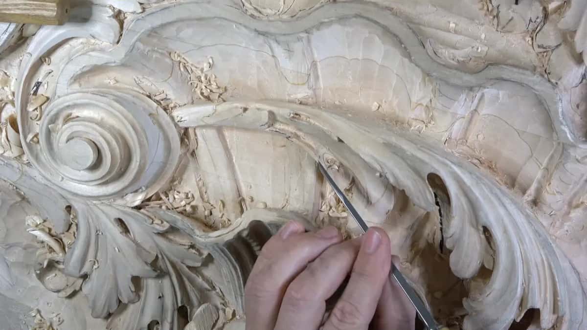 Fingertips steer a narrow blade.
