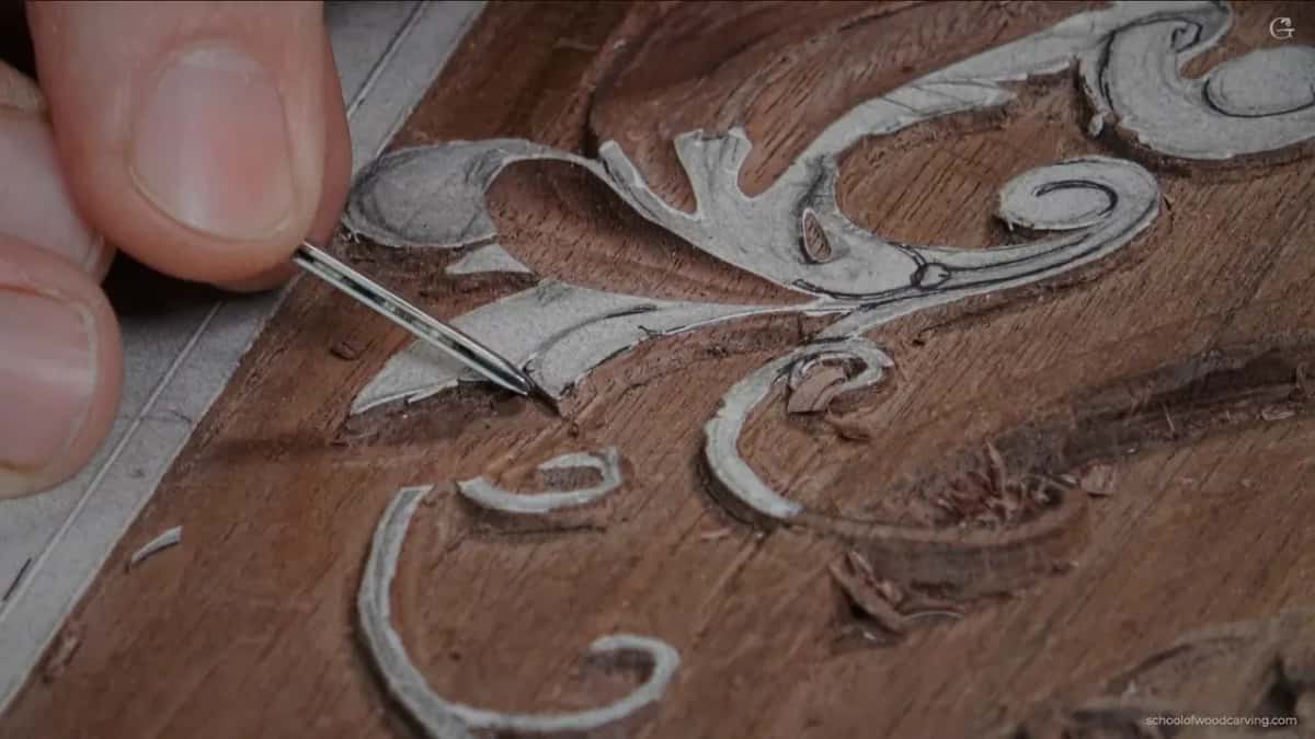 A blade travelling under an edge, half of one millimetre and no further.