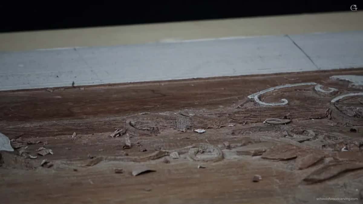 Chips lying where they fell, the cut deliberately short of the floor.