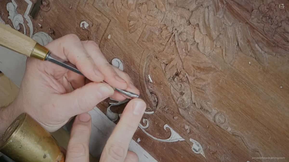 A pale handle leaning slightly away, which is what square to the bevel looks like in the hand.