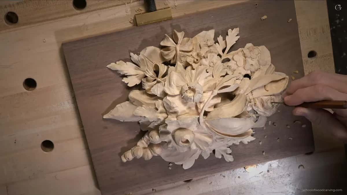 From above, the panel on its board with one hand in from the right