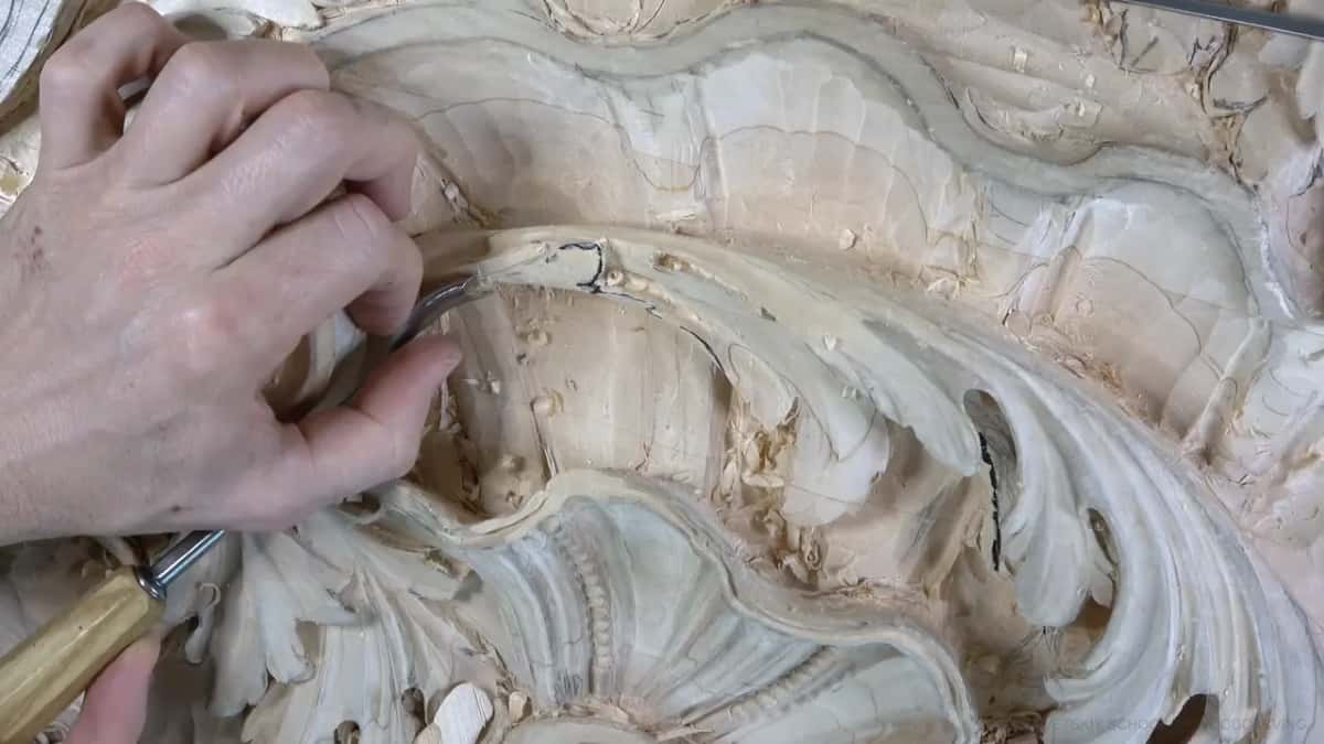 Pale handle near the scroll.