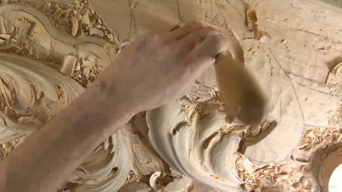 Palm on the handle.