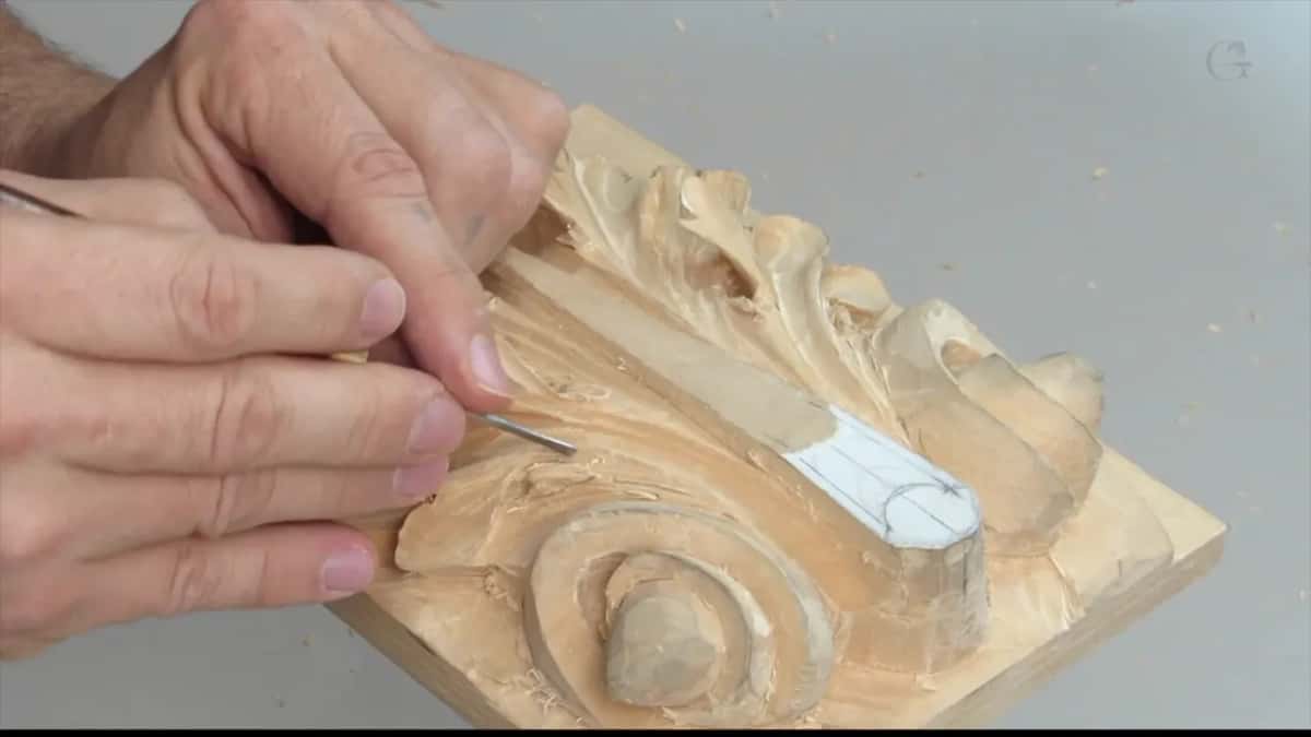 Forearm laid across the top while a tool arrives on that side