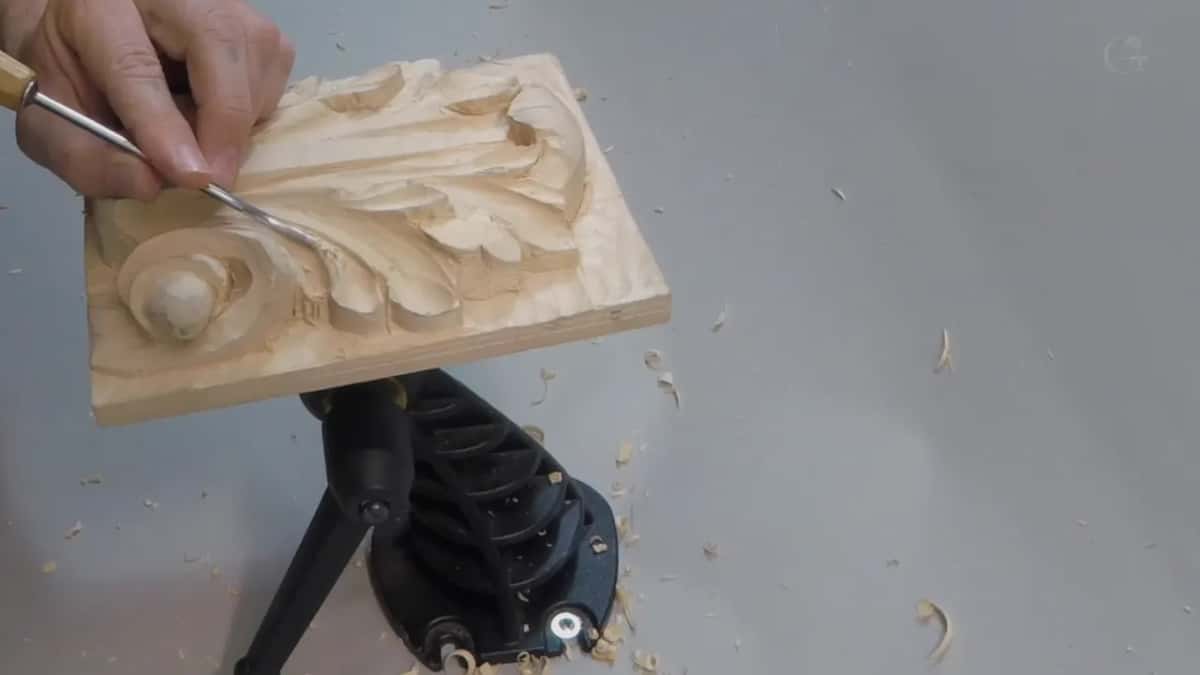 Slim back bent blade working the upper left of the leaf while the handle rides clear of the standing pipes