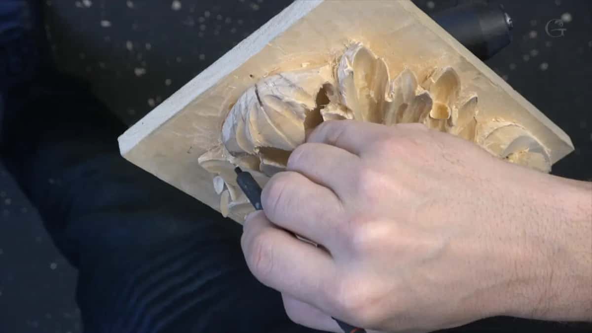 Hand across the tipped board