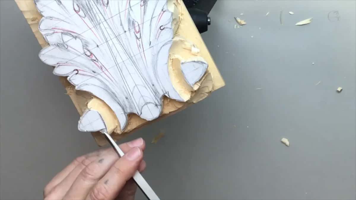 Slim straight blade at the lower left volute, paper still on top