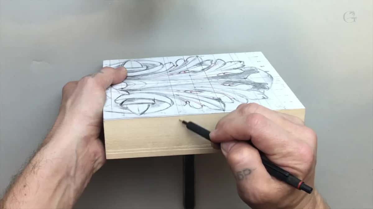 Pen marking the side of the block near the top, while a scored line runs low along the same face