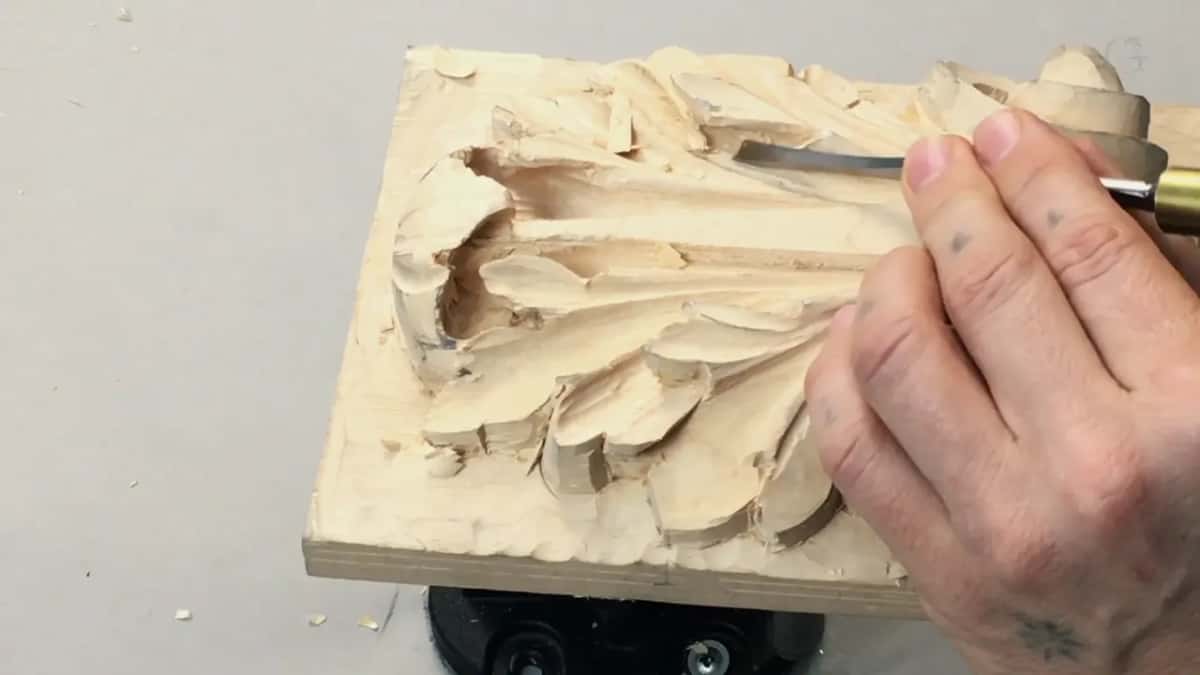 Laid flat on the table, a brass ferruled tool arrives from the right to repeat the pass