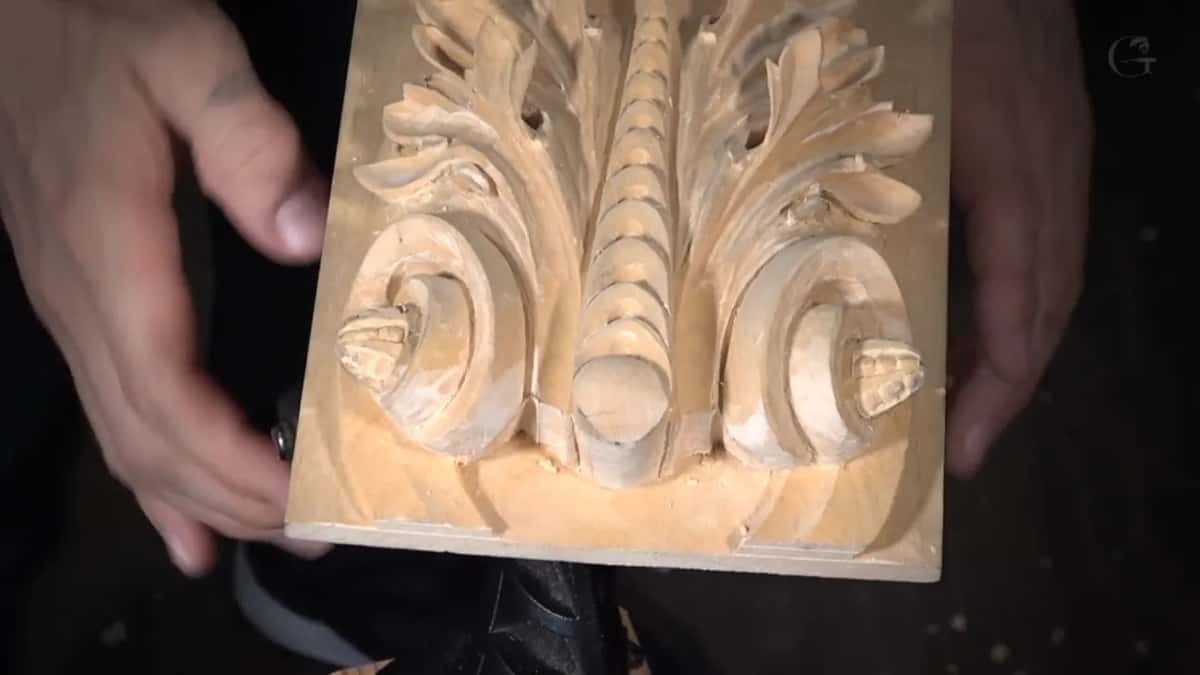The finished Roman acanthus leaf held in both hands