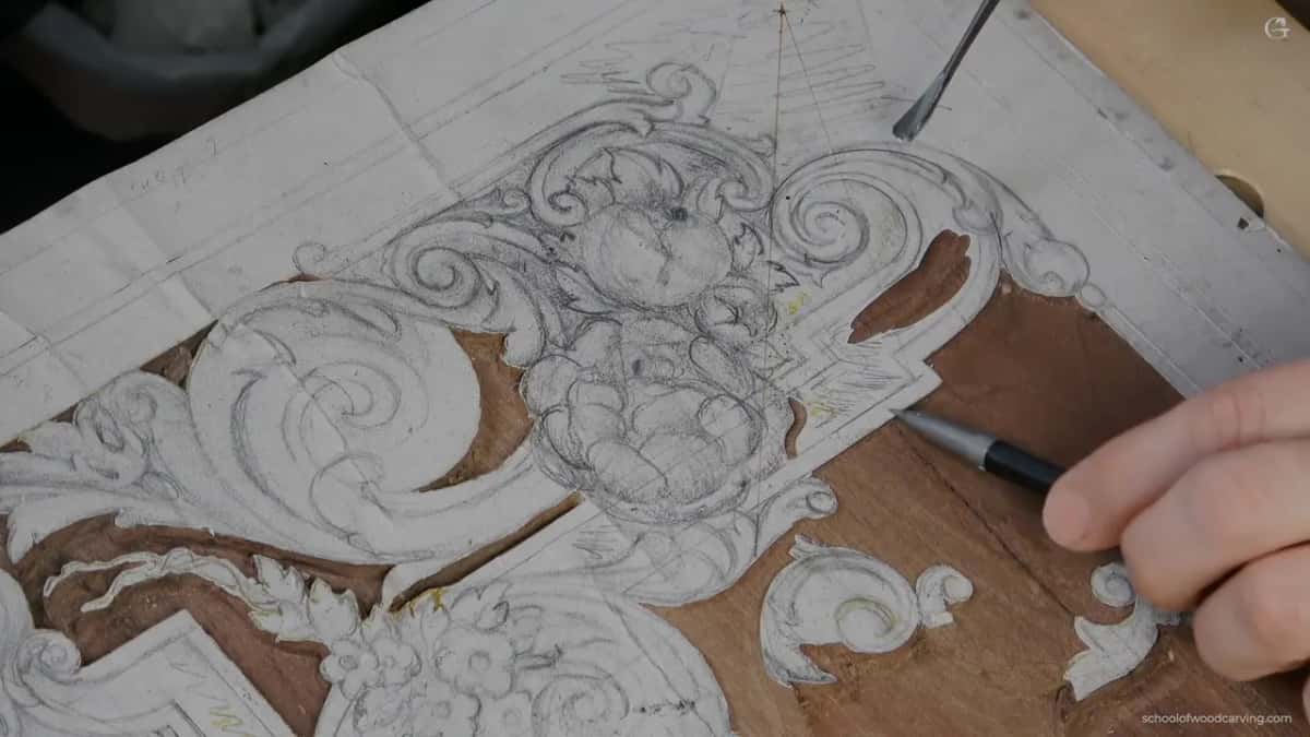 Dark tool taking waste on the right hand side of the drawn ornament.