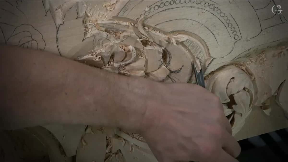 Forearm across the board and a gouge down in the scroll