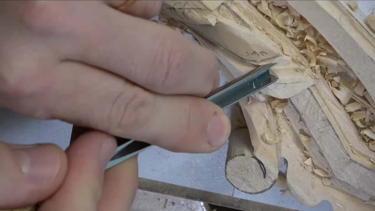 Rolling the gouge left at the finish of a stroke so the wall rises into a ridge.
