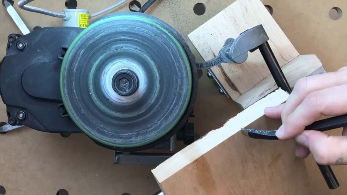 The edge rubbed along the end grain of a board.