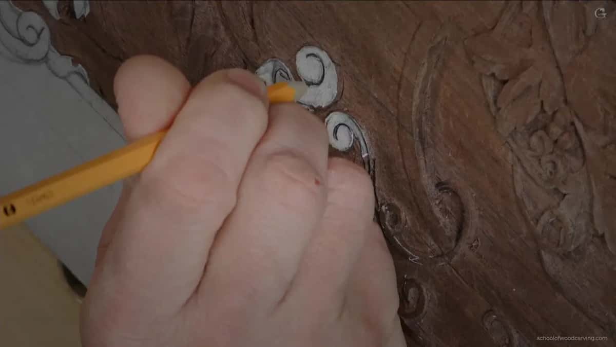 Yellow pencil in my hand, drawing where the leaning face of the volute will finish.