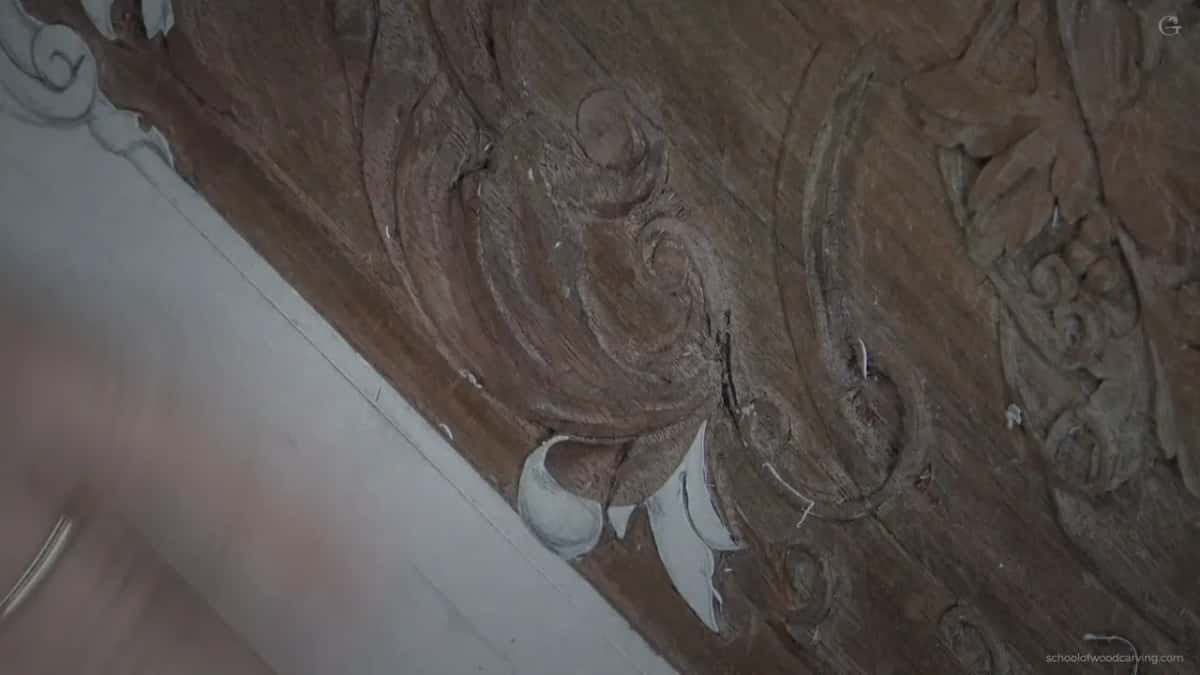 Carved band seen at an angle, shadow now sitting under the edge.