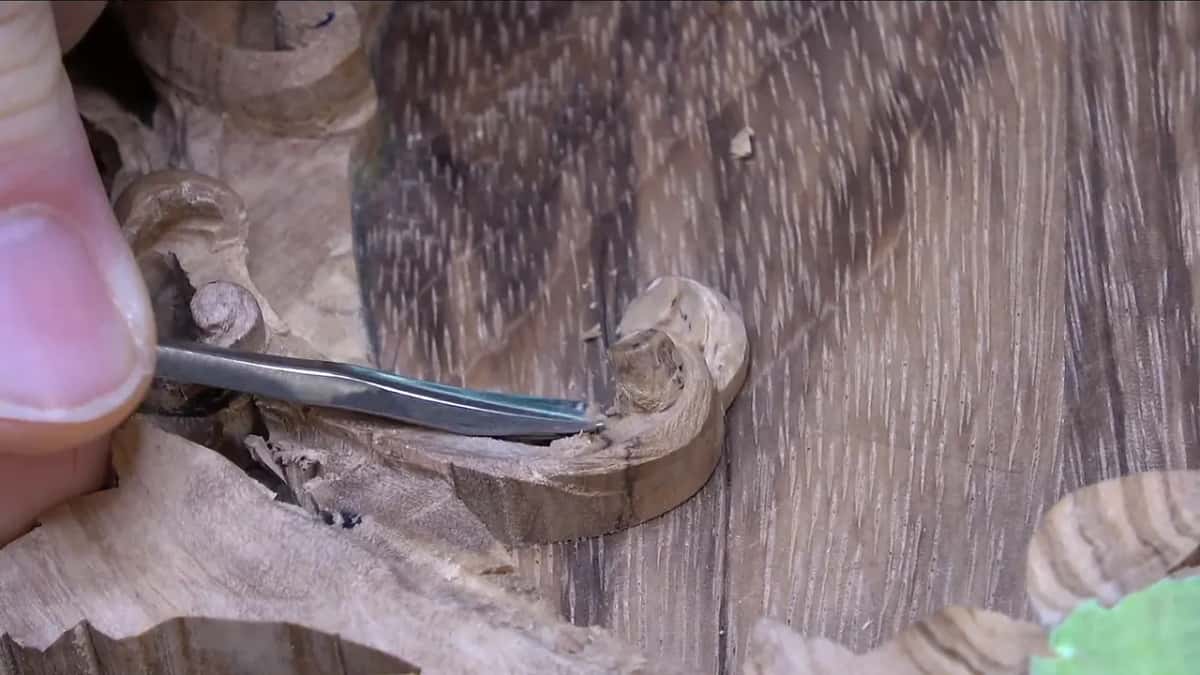 Gouge slicing into the curl from the left