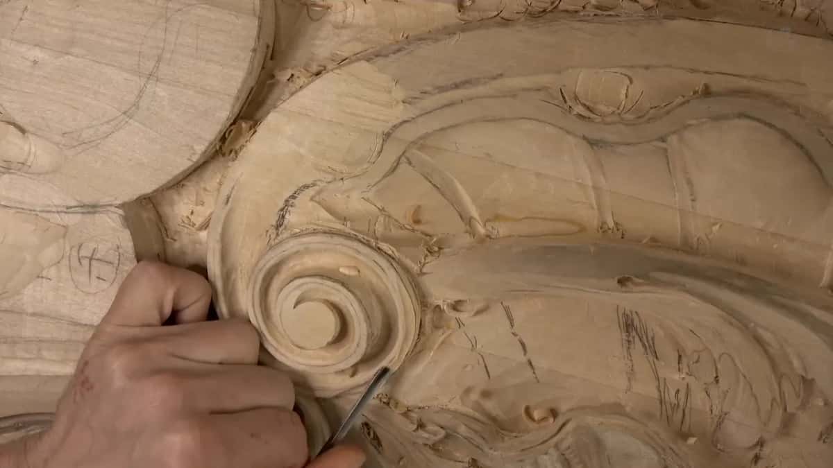 Thin gouge at the lower right of the volute.