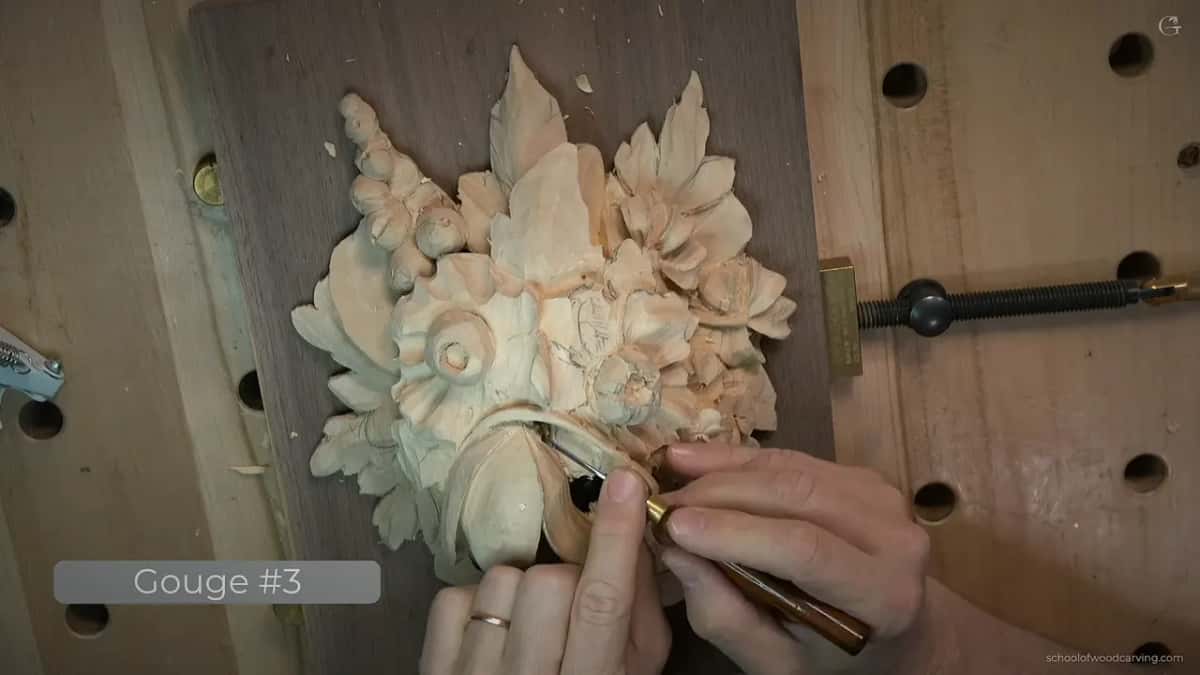 The card on screen reads Gouge #3 while the small tool traces round the petal next to the stem