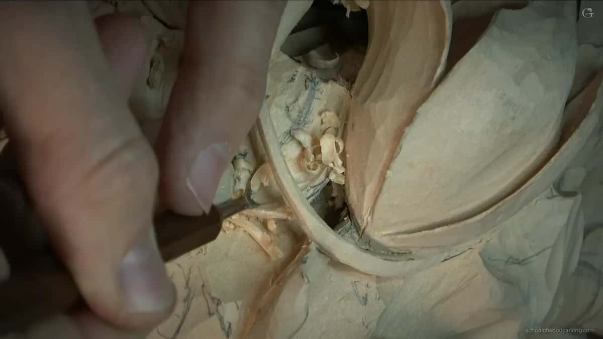 Thumb pressed on the handle, working small