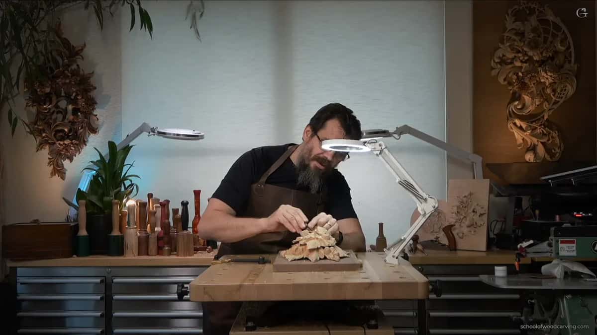 Leaning in over the work