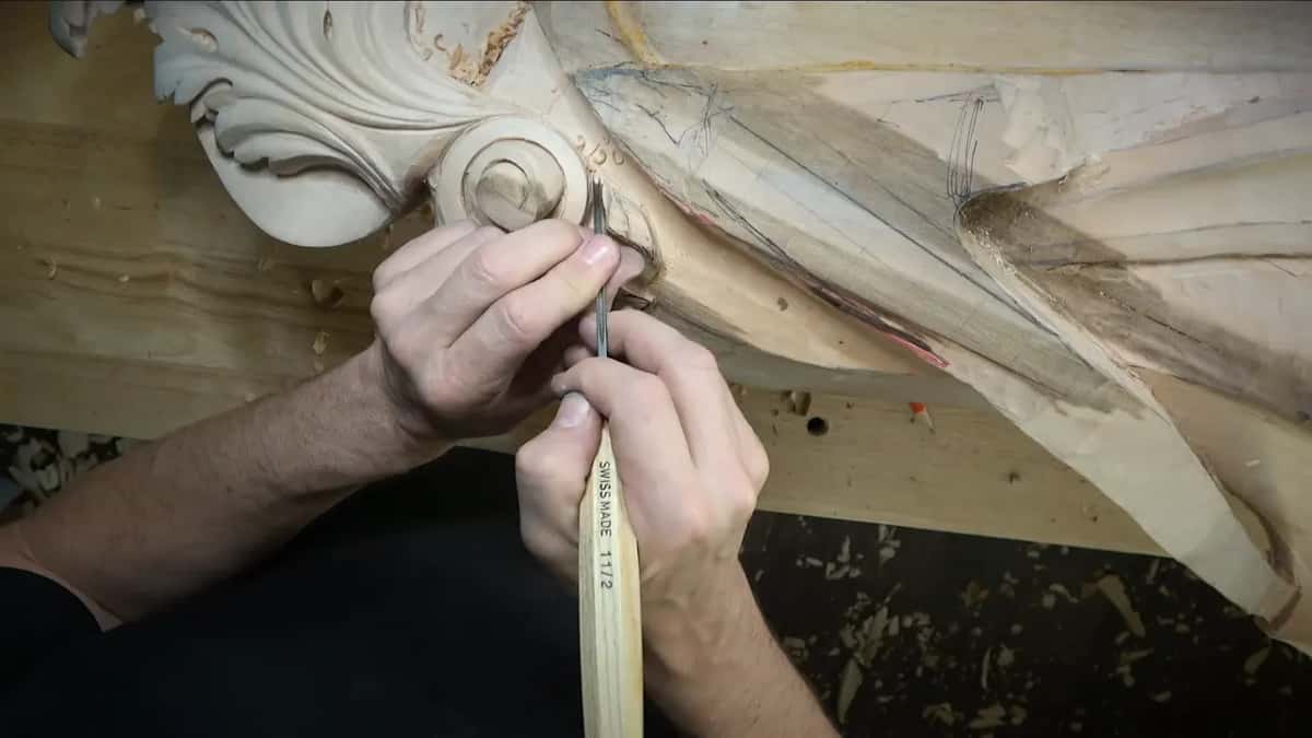 Handle stamped Swiss made 11/2 as the veiner works into the curl