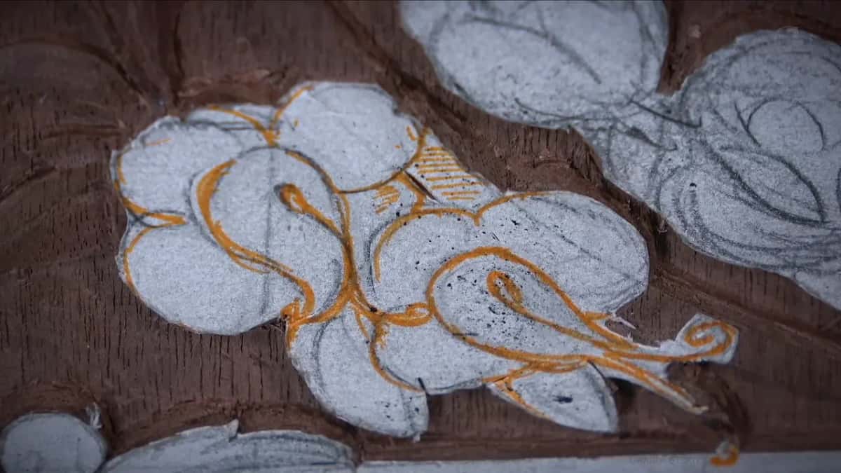 Orange lines drawn on chalk