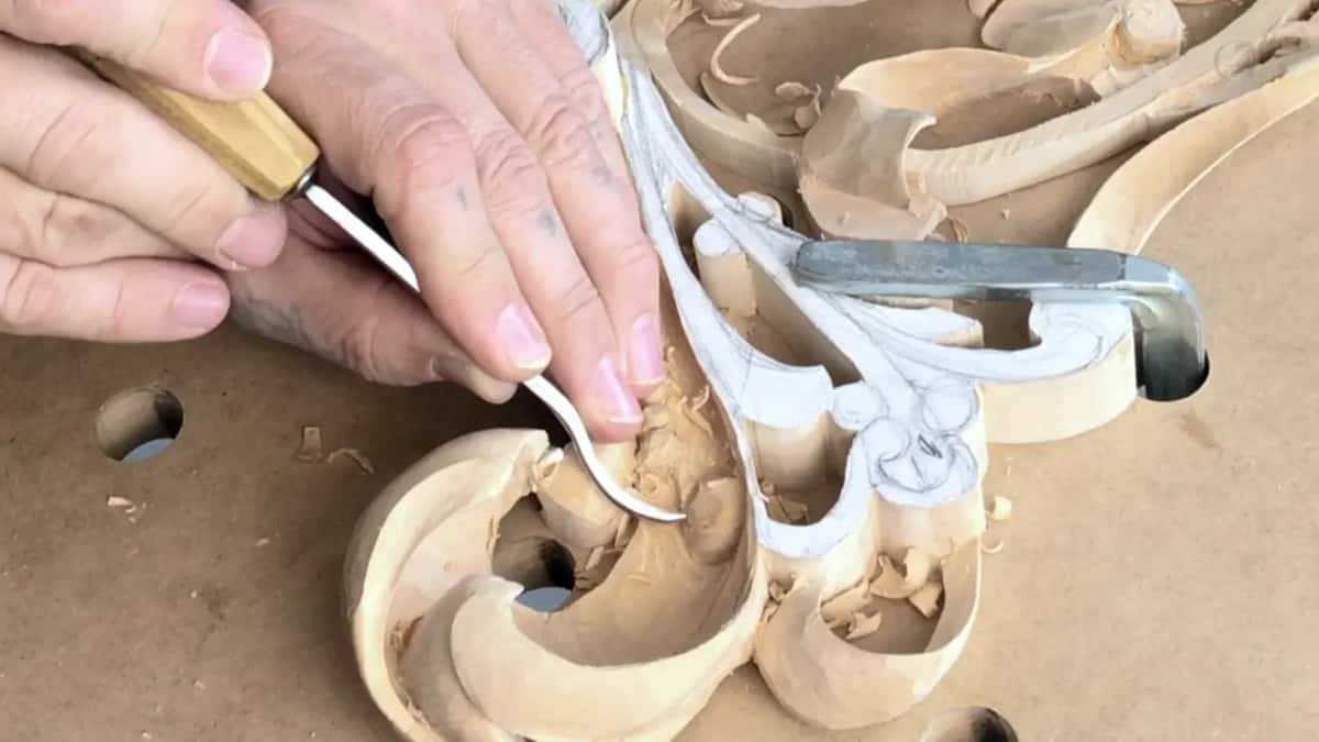 A light handle and a narrow blade, working the last of the divisions before any cleaning happens.