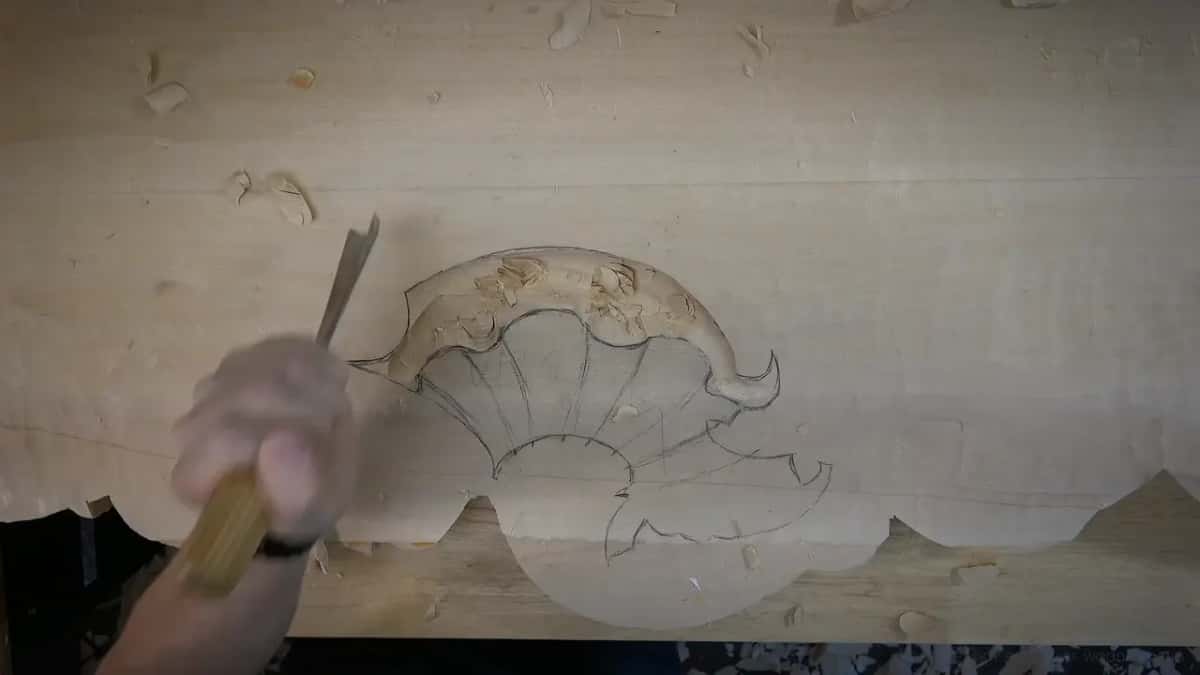 An inch down Bright gouge going straight down into the shell drawn in pencil on the roughed surface