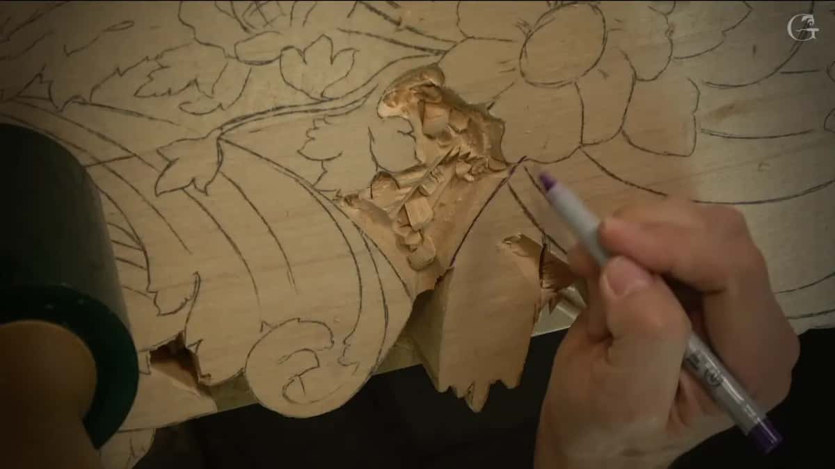 Purple marker making a small mark where one surface turns into the next.