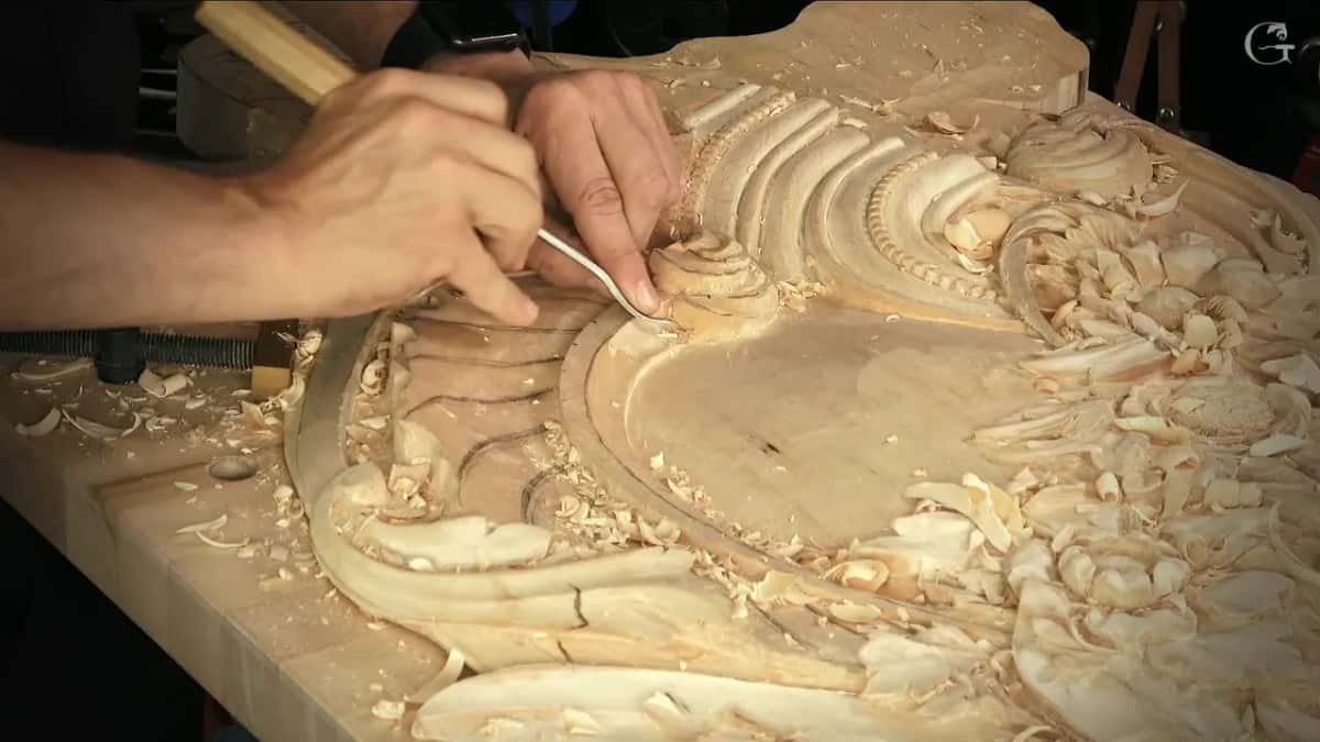 Beaded molding Long handle in one hand, the other guiding the blade, with the beaded molding running past the curl