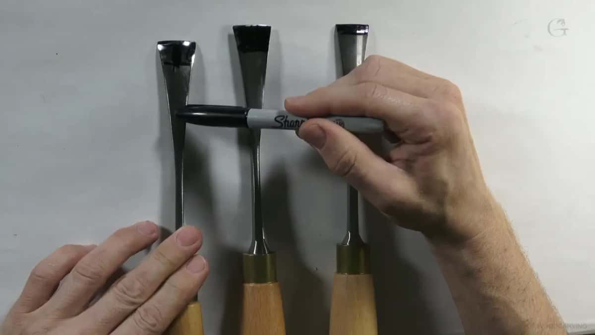 Marker tracing the line of the bevel so the heel shows on camera.
