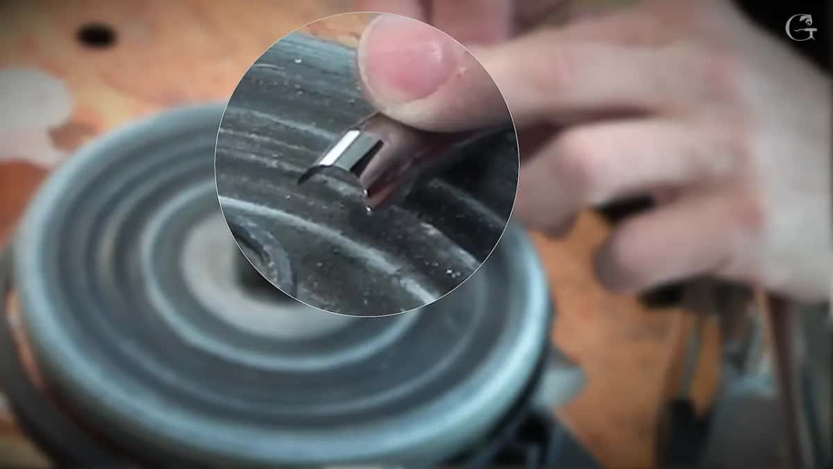 Magnified circle shows the bevel throwing back light