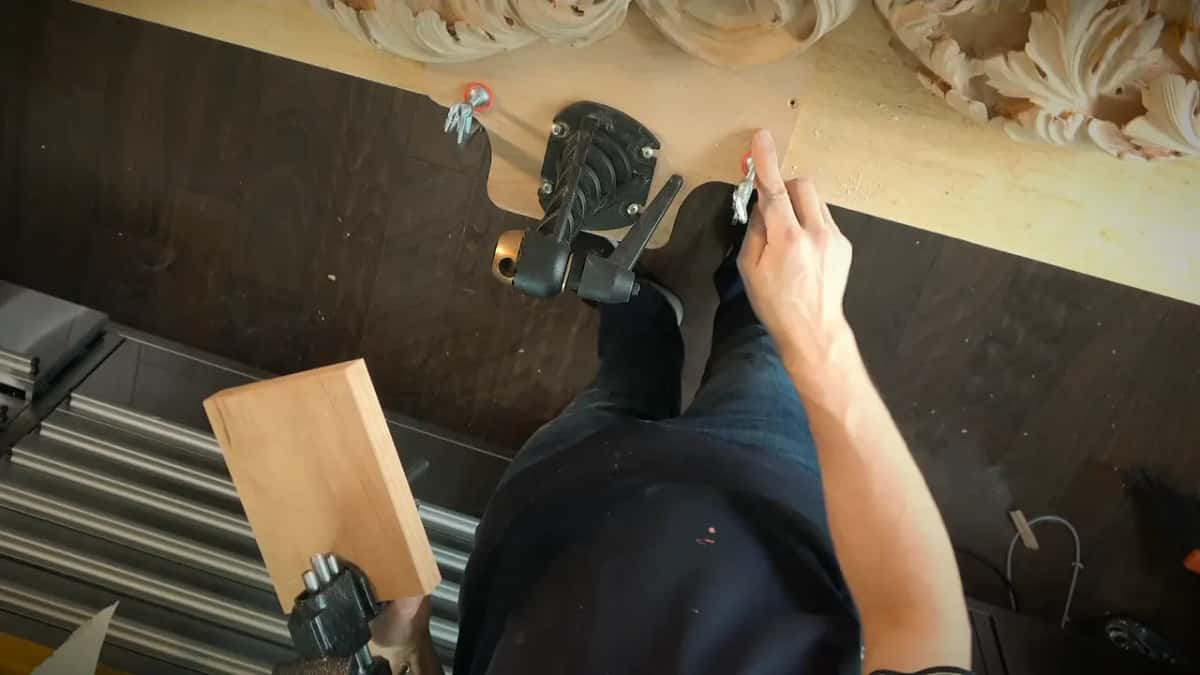 The whole setup Overhead of the vice hardware on its plywood board, finished acanthus resting at the top of the frame