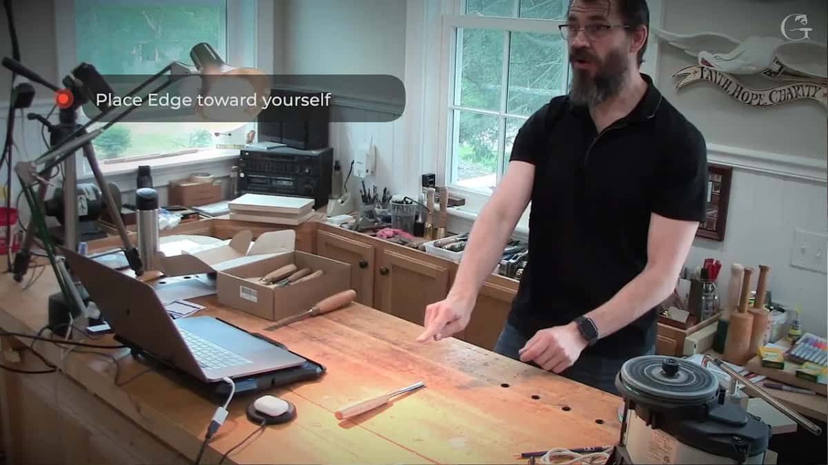 Looking down at the bench, one tool within reach and nothing else out.