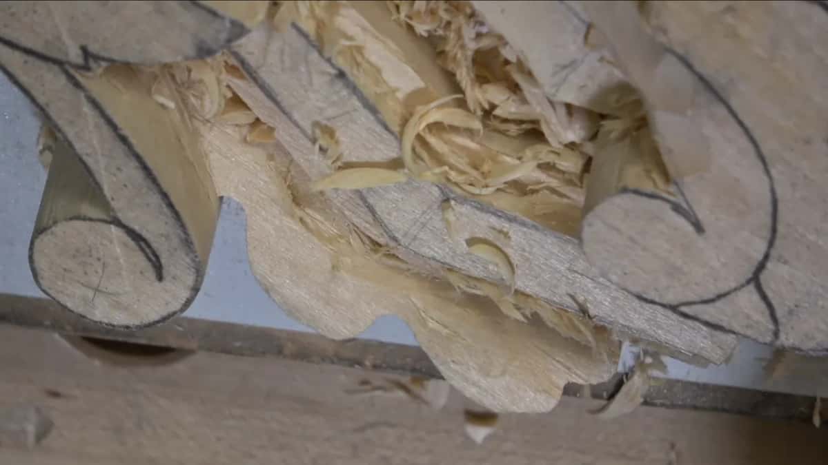 Rough wood and shavings near a volute