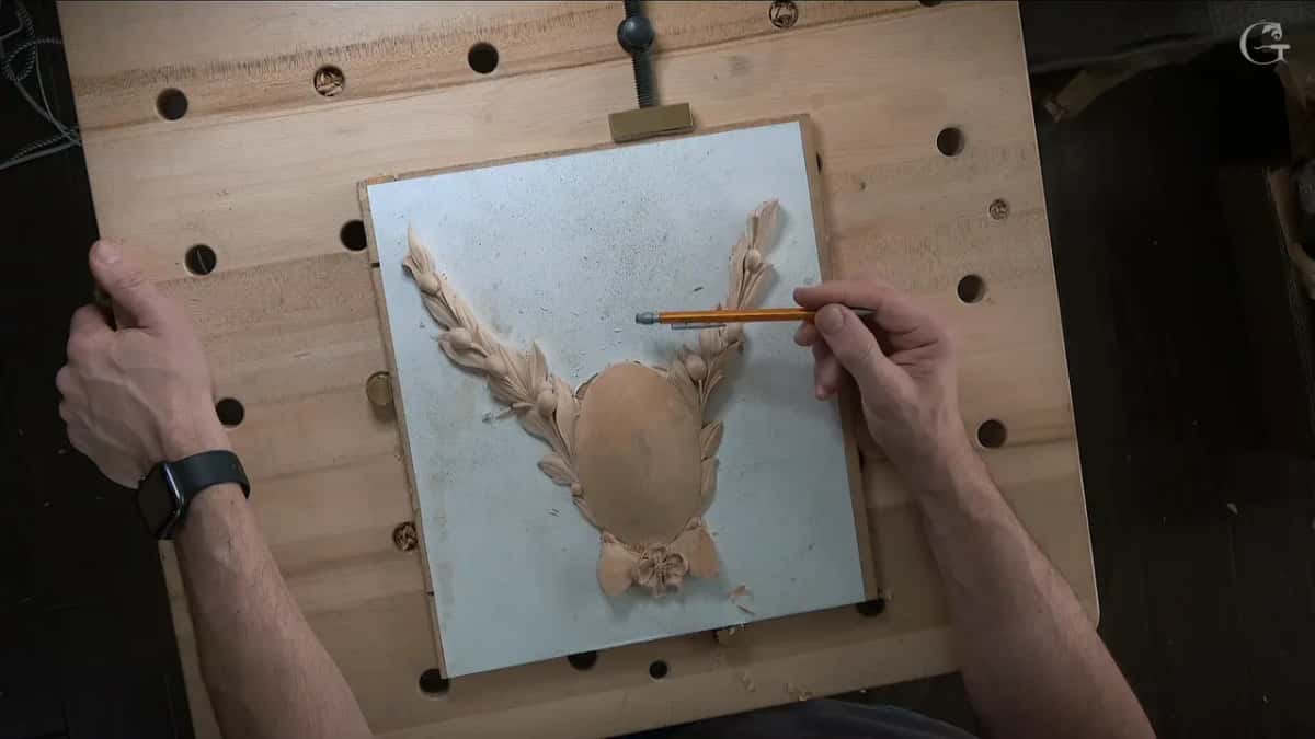 From above, a pencil points at the right spray