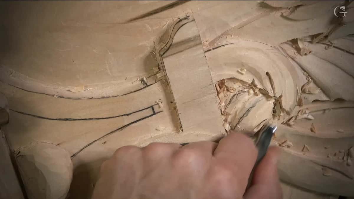 A narrow blade working under the eye, pencil lines left of it