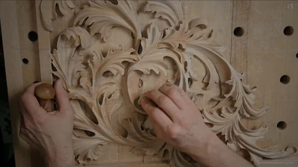 Rubbing the shade with a rounded wood scrap.