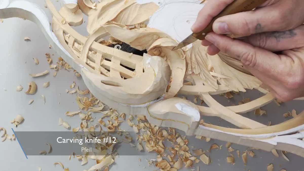 Knife at a curl, caption reading Carving knife #12