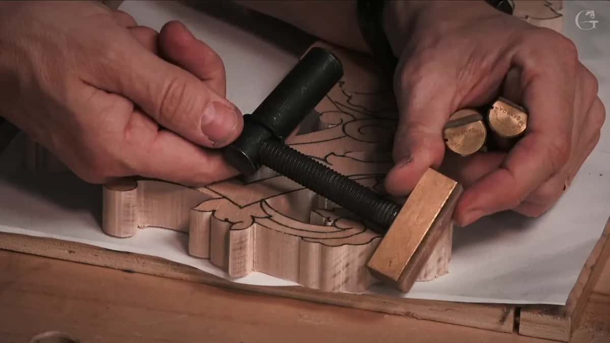 Brass pegs and a clamp
