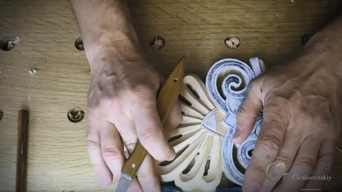 Knife plus a steadying hand.