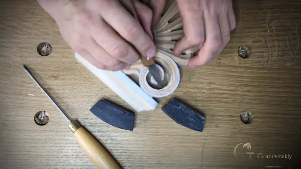 Two hands working one knife, right spiral