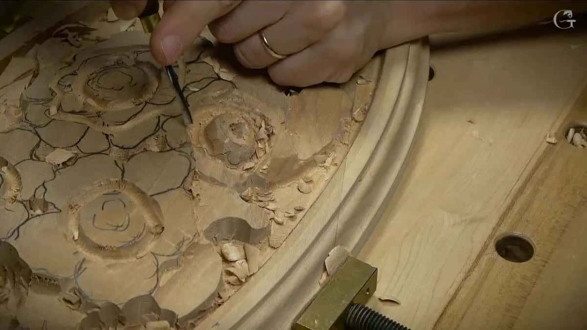 Rim around one center hole, under a small tool