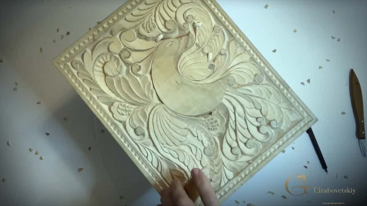 Bird panel, knife beside