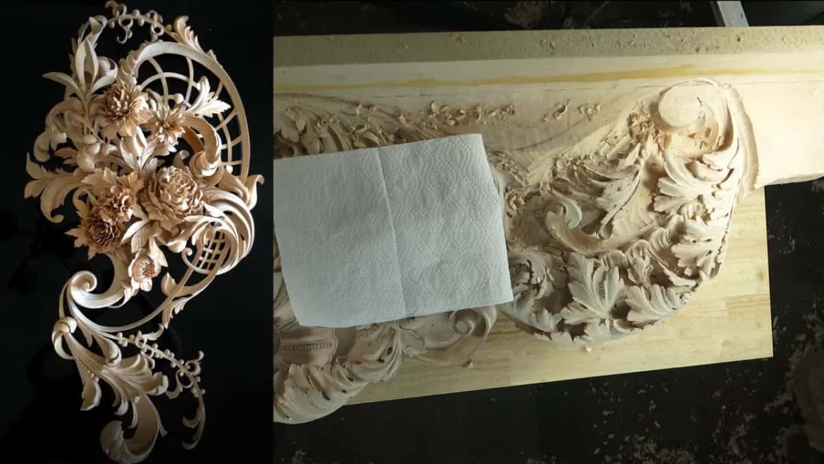 Paper towel resting on a finished stretch of acanthus, next to a photo of a pierced flower carving