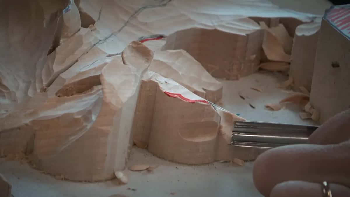 Close up of a hollow as the gouge slides in from the right
